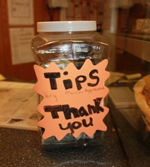 Sometimes, a tip jar is placed at the front counter in a cafe or counter service area, and tips distributed to staff afterwards.